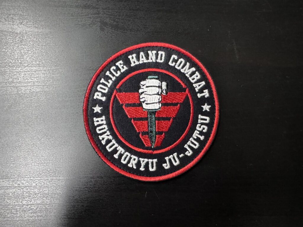 policehandcombatbadge